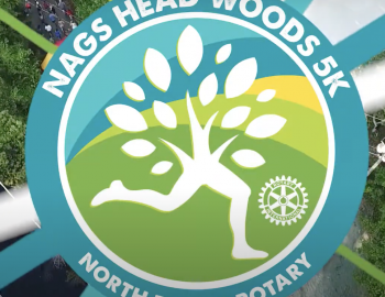 Green, White, and Blue Logo for Nags Head Wood 5K