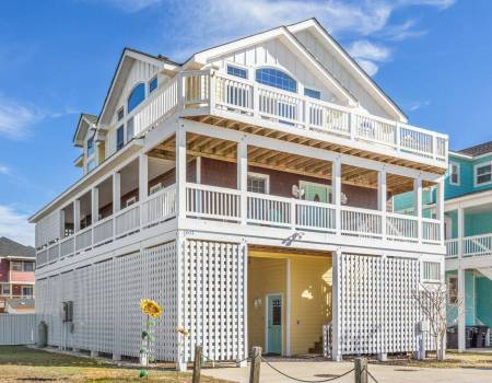 Sunflower Siesta Sunflower Siesta is a cheery beach home just a 3-minute walk to the beach!