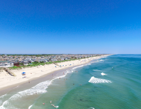 View of the coastline in Corolla on a sunny summer day.