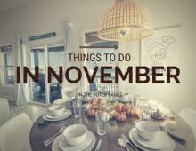 Things to do in November on the Outer Banks. Thanksgiving table in white room with ocean in the window background