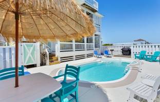 Sunflower Siesta is a cheery beach home just a 3-minute walk to the beach!