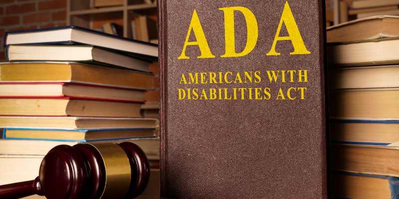 Library background and books with text ADA: Americans with Disabilities Act