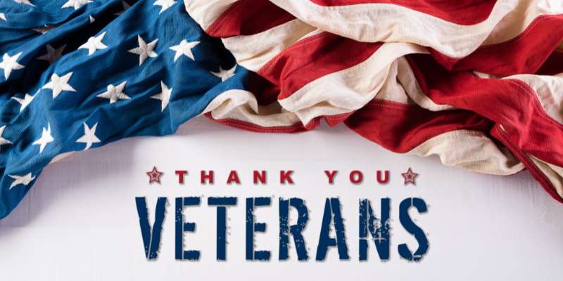 White background with American flag across the top and the words Thank You Veterans below.