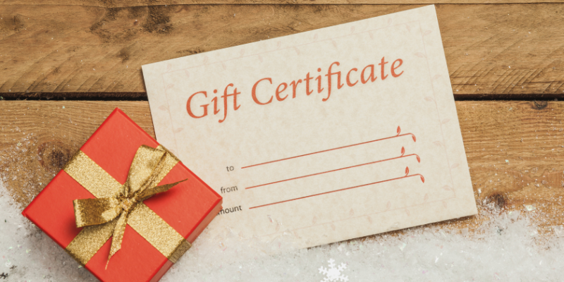 Gift Certificate with red present box and snow.