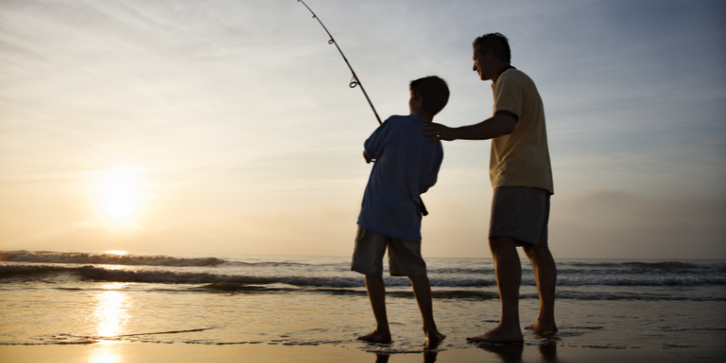Father and Son Surf Fishing