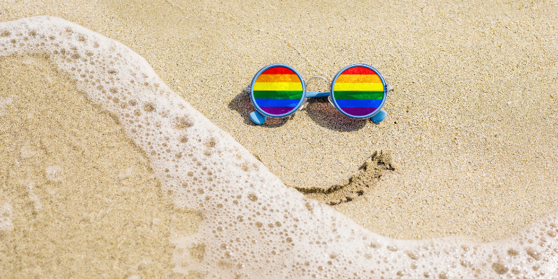 Rainbow Sunglasses on a Beach