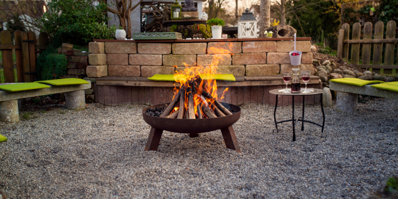 Fire pit in gravel.